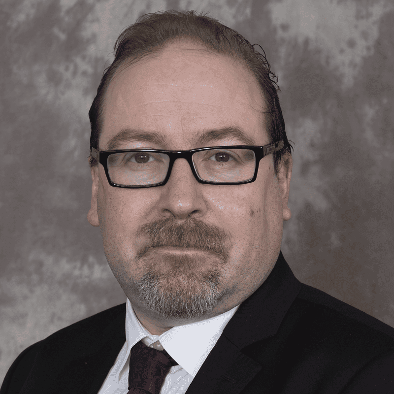 Portrait of Professor Simon James