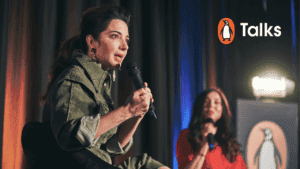 Marie Forleo and Cash Carraway speaking at penguin event