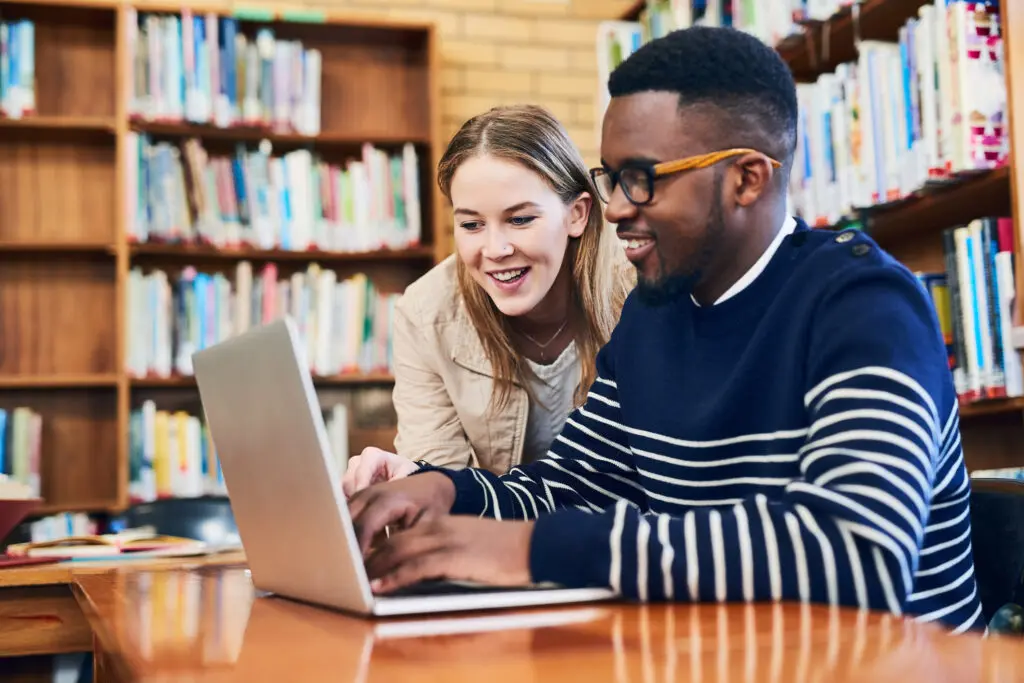 Students studying in library