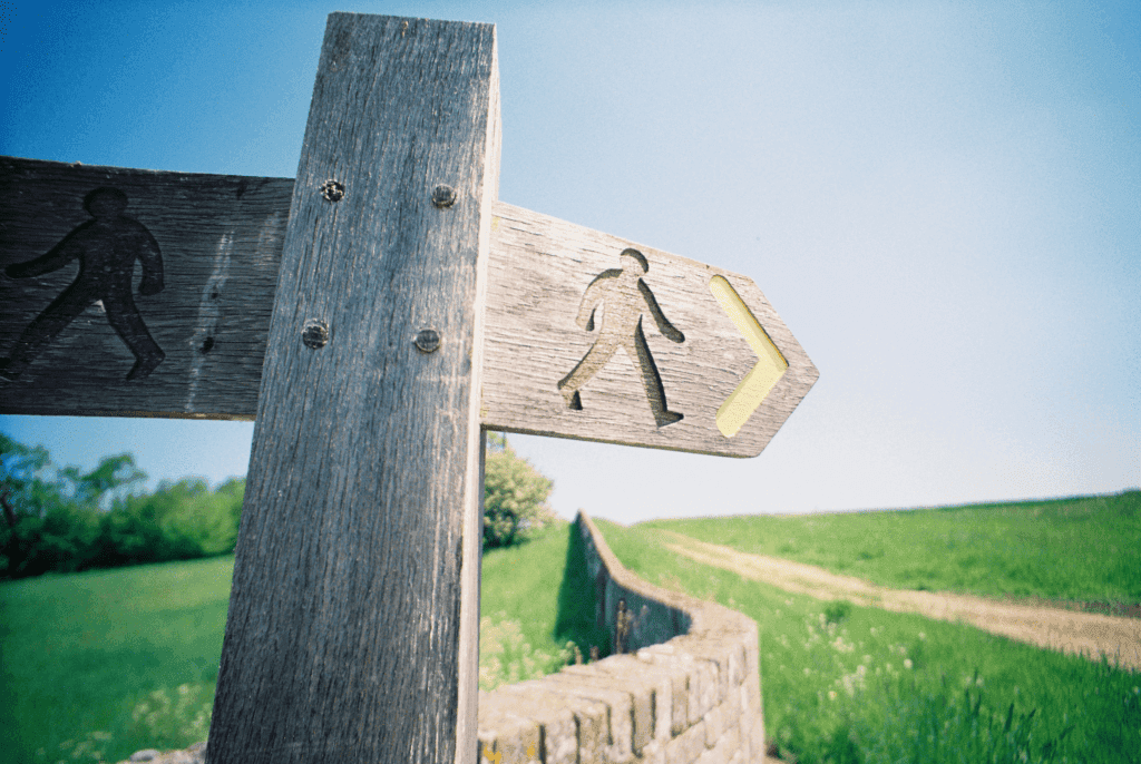 Walking route directions sign.